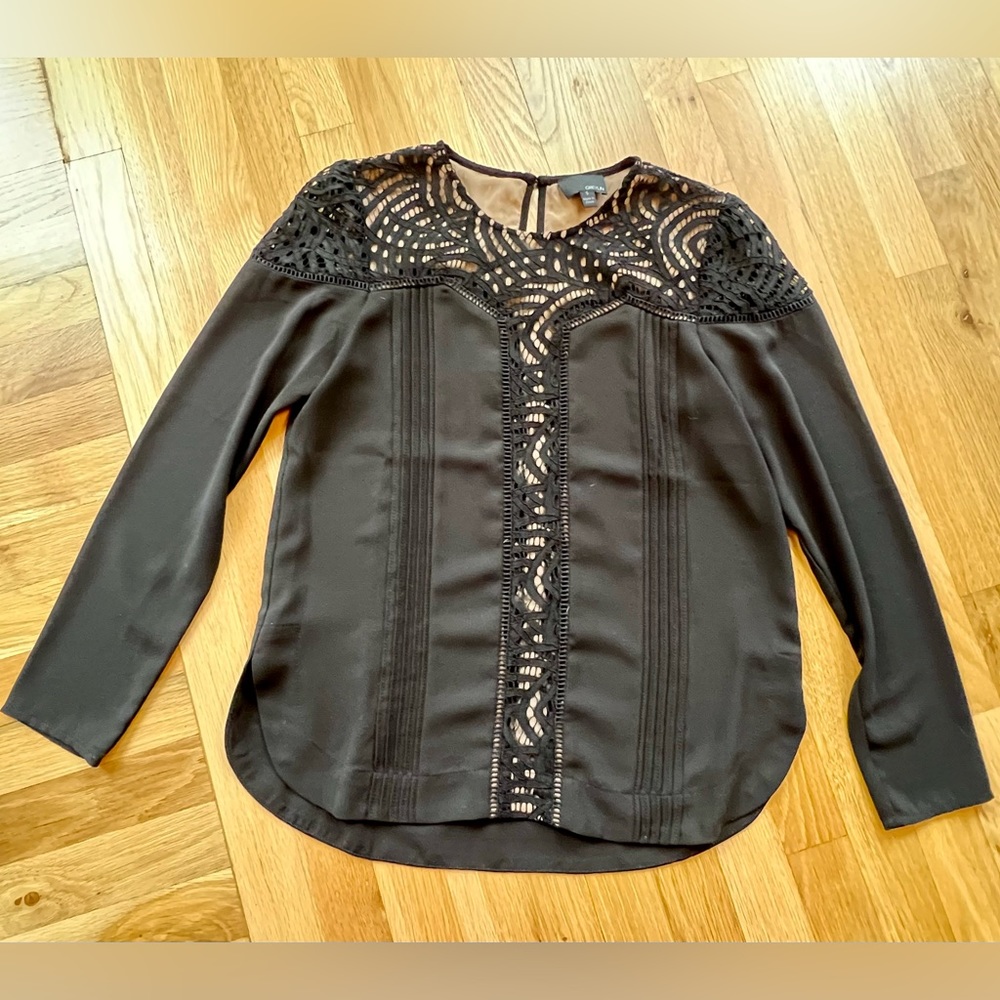 Blouse with cut out design, size small